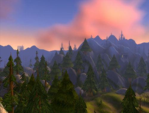 Panoramic view of the mountains around Loch Modan at sunset.