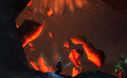 A death knight stands over rocky precipice in Stonecore.